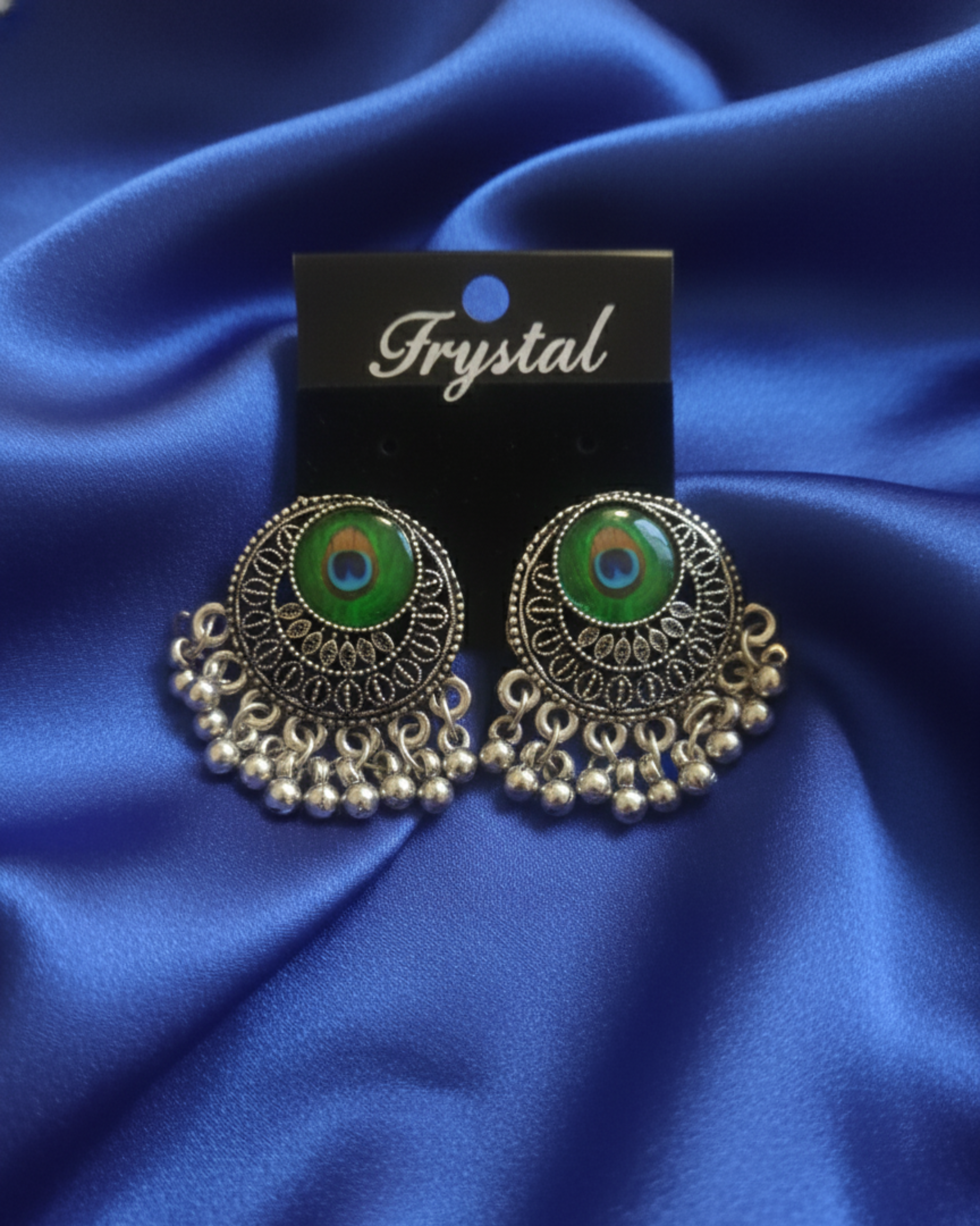 Oxidized Silver Earrings with a Peacock Design in the Center