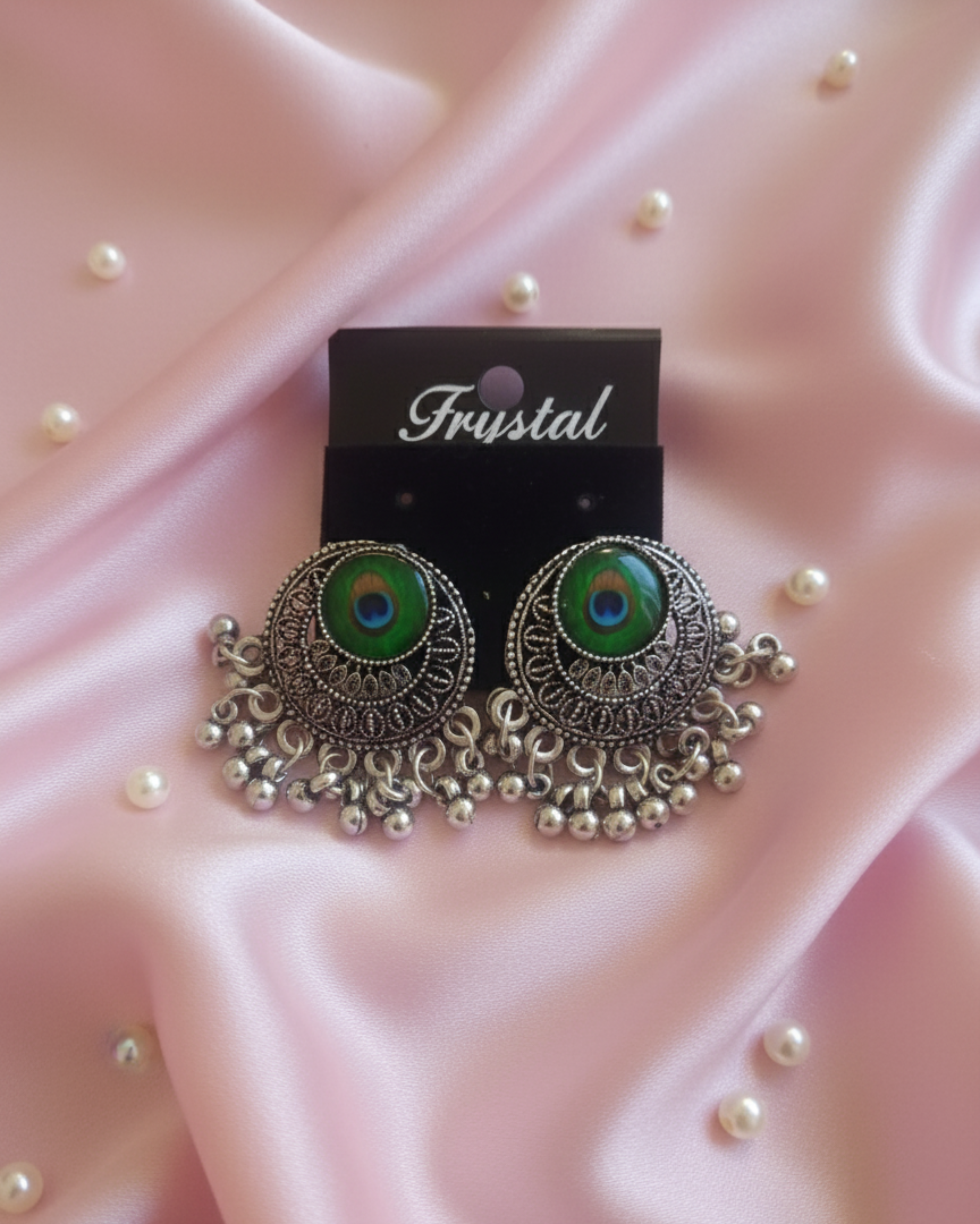 Oxidized Silver Earrings with a Peacock Design in the Center