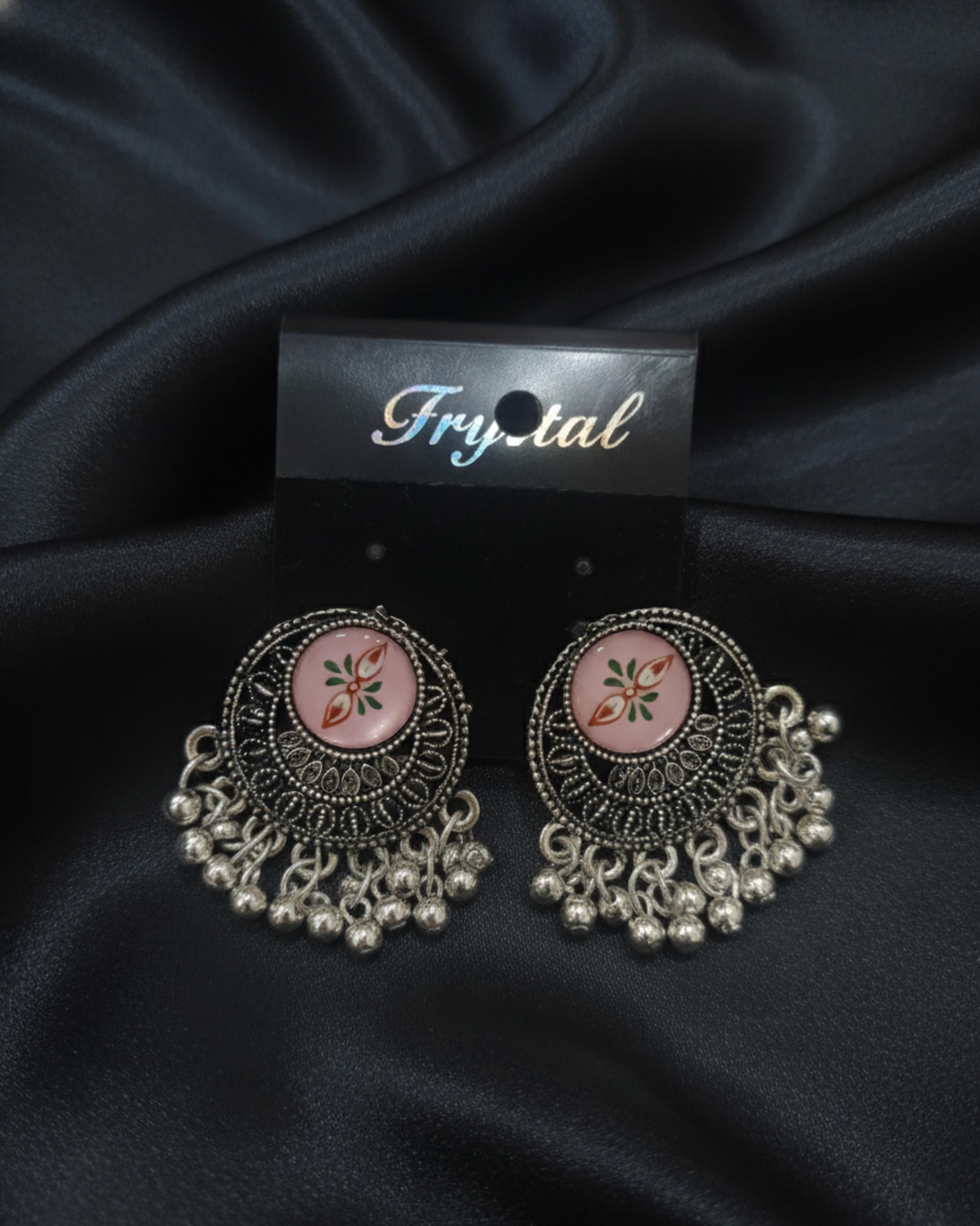 Oxidized Silver Earrings with a Peacock Design in the Center