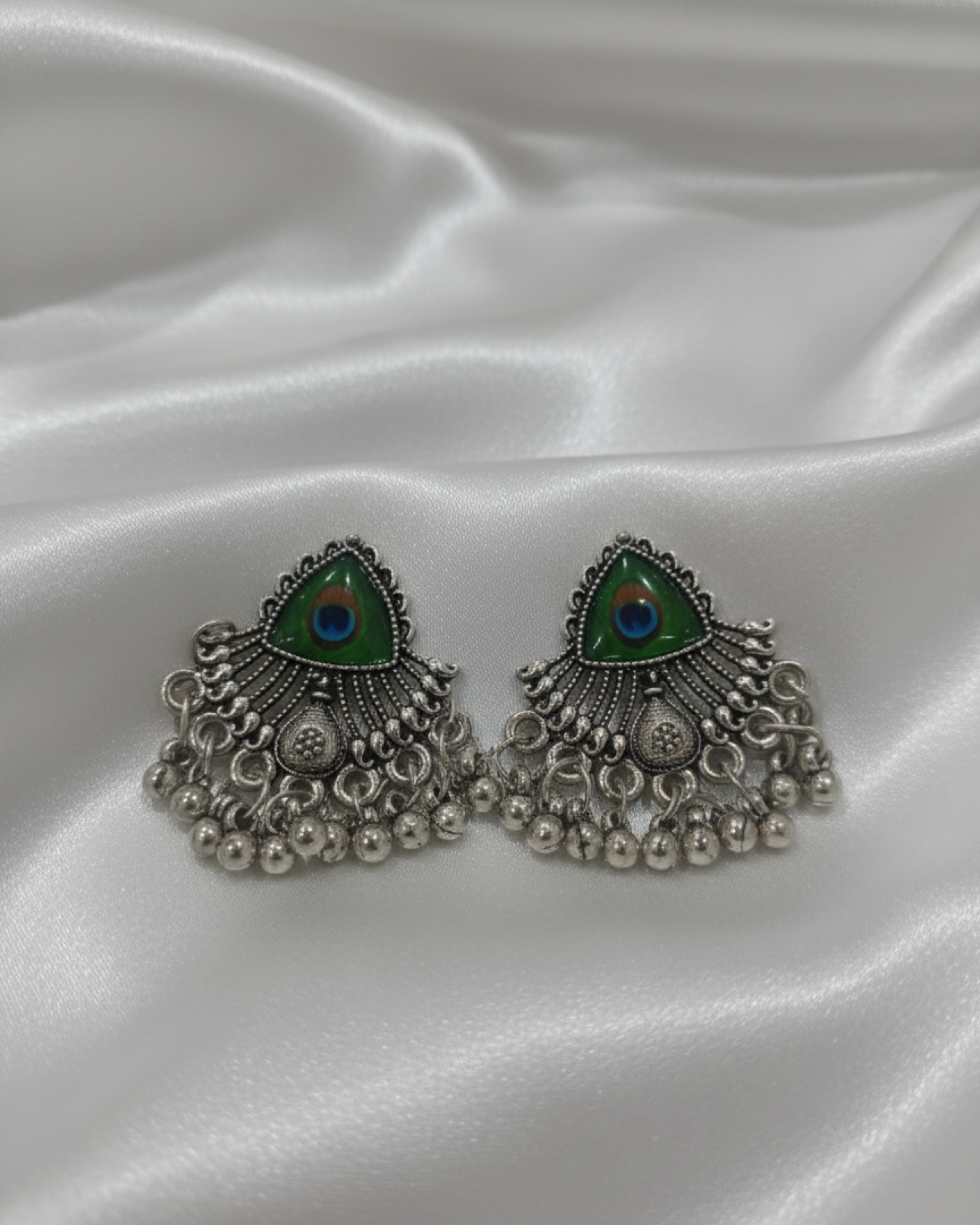 Oxidised Daily Wear Jhumka Earrings with Peacock Design in Centre