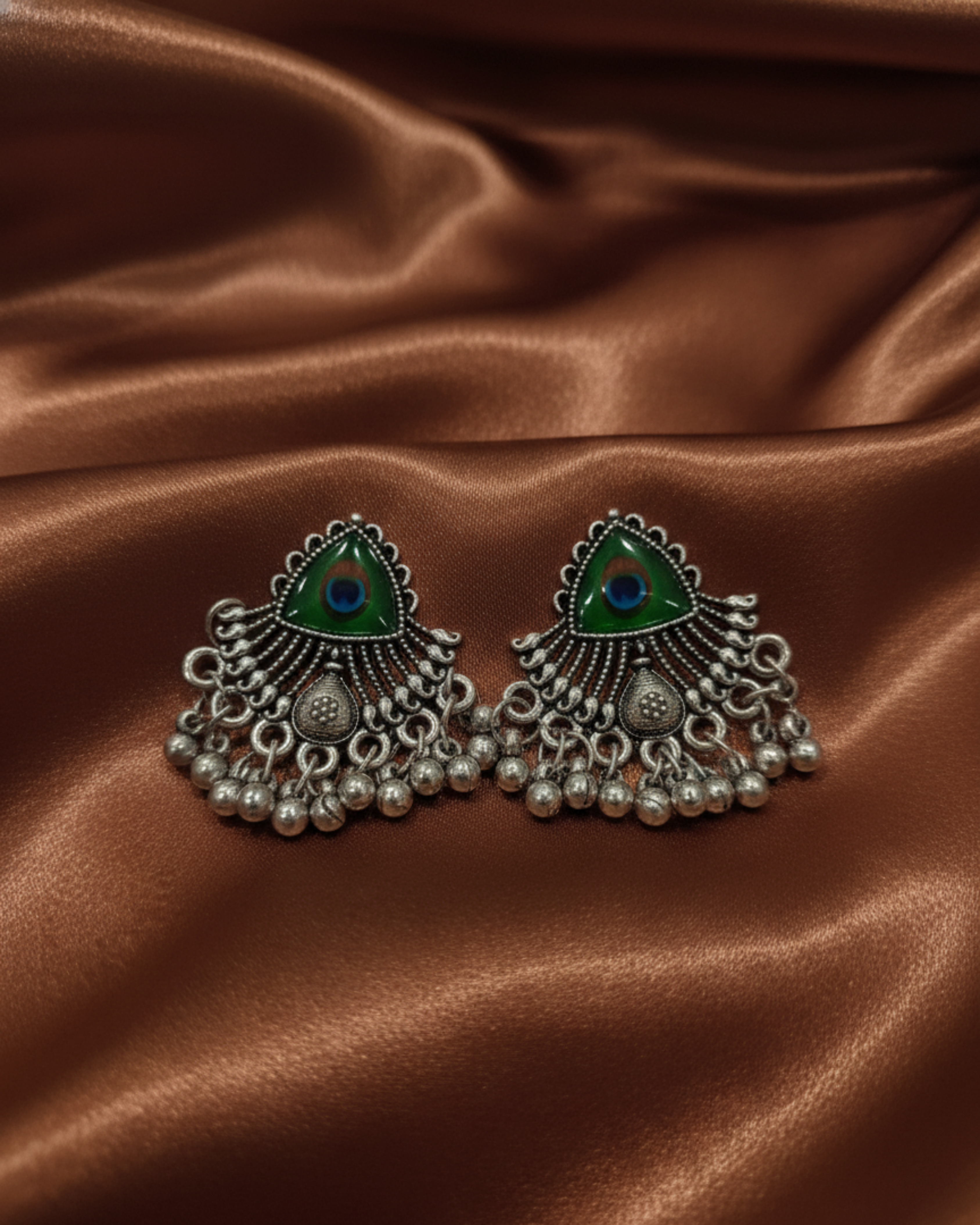 Oxidised Daily Wear Jhumka Earrings with Peacock Design in Centre