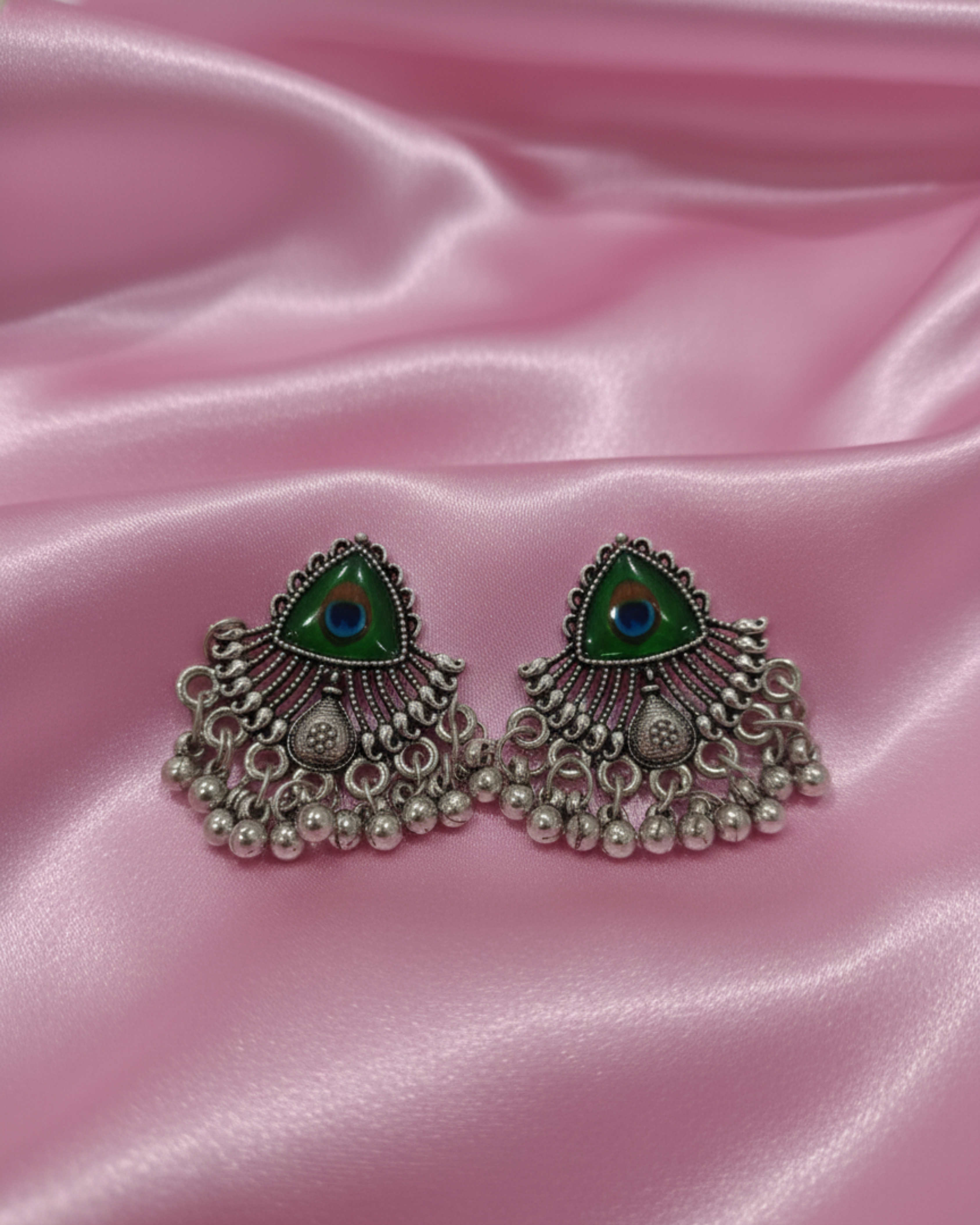 Oxidised Daily Wear Jhumka Earrings with Peacock Design in Centre