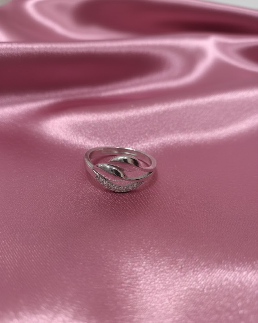 Sterling Silver Winding Wave Ring with American Diamonds