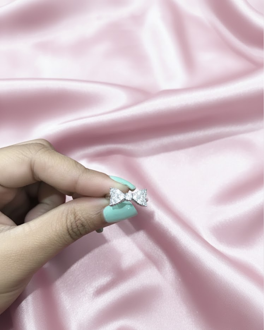 Sterling Silver Adjustable Bow Ring with Cubic Zirconia Stones