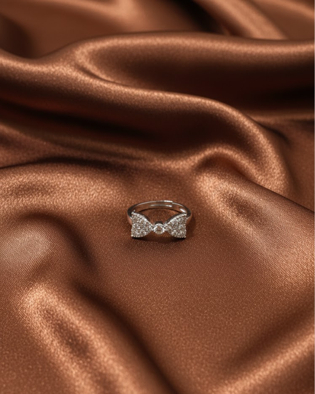 Sterling Silver Adjustable Bow Ring with Cubic Zirconia Stones