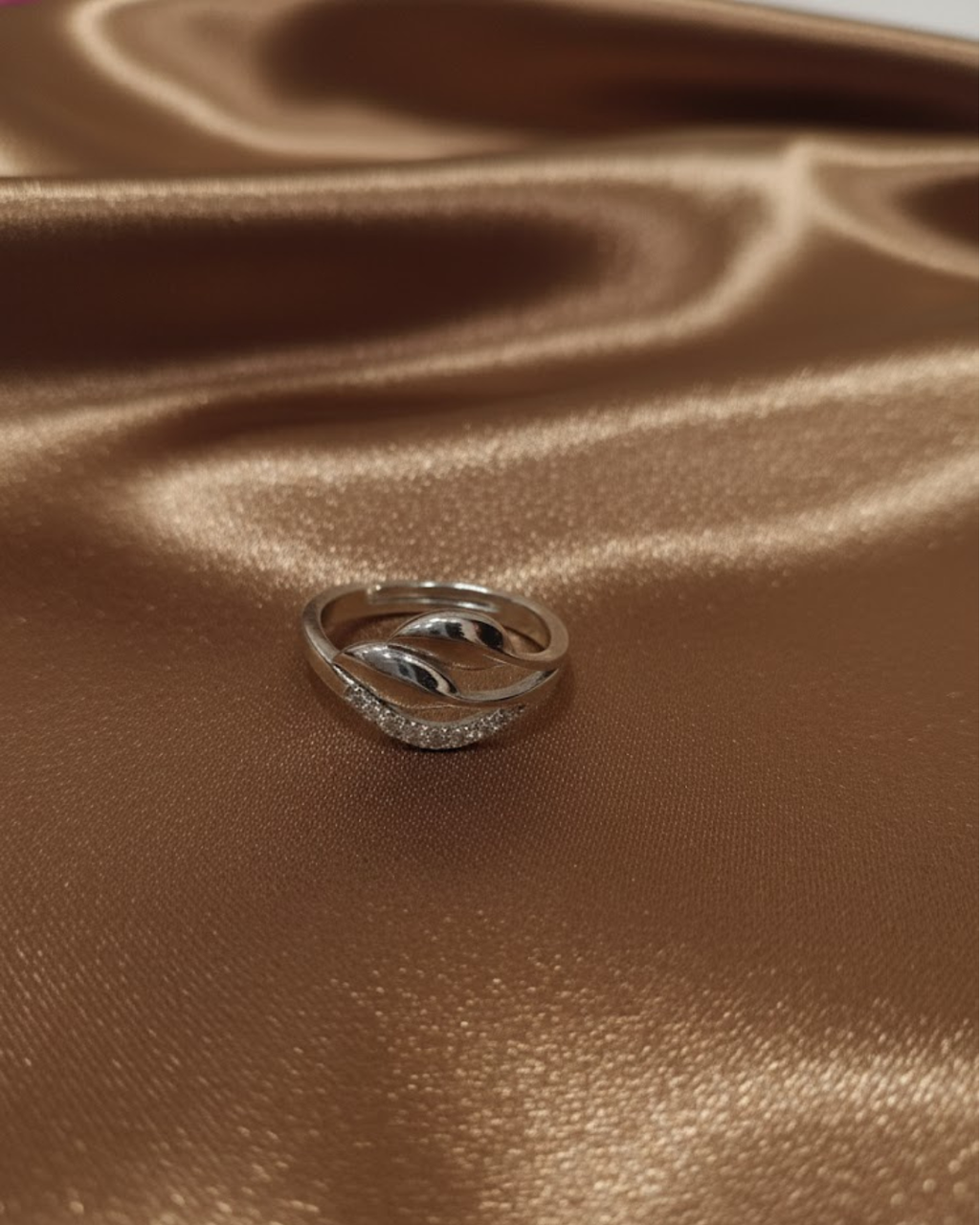 Sterling Silver Winding Wave Ring with American Diamonds