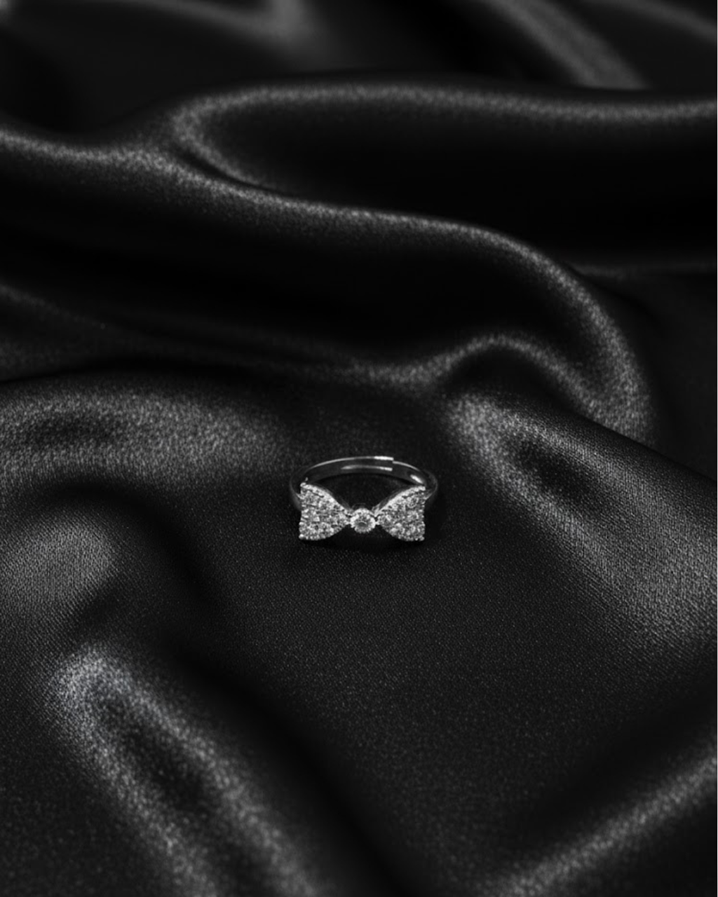 Sterling Silver Adjustable Bow Ring with Cubic Zirconia Stones