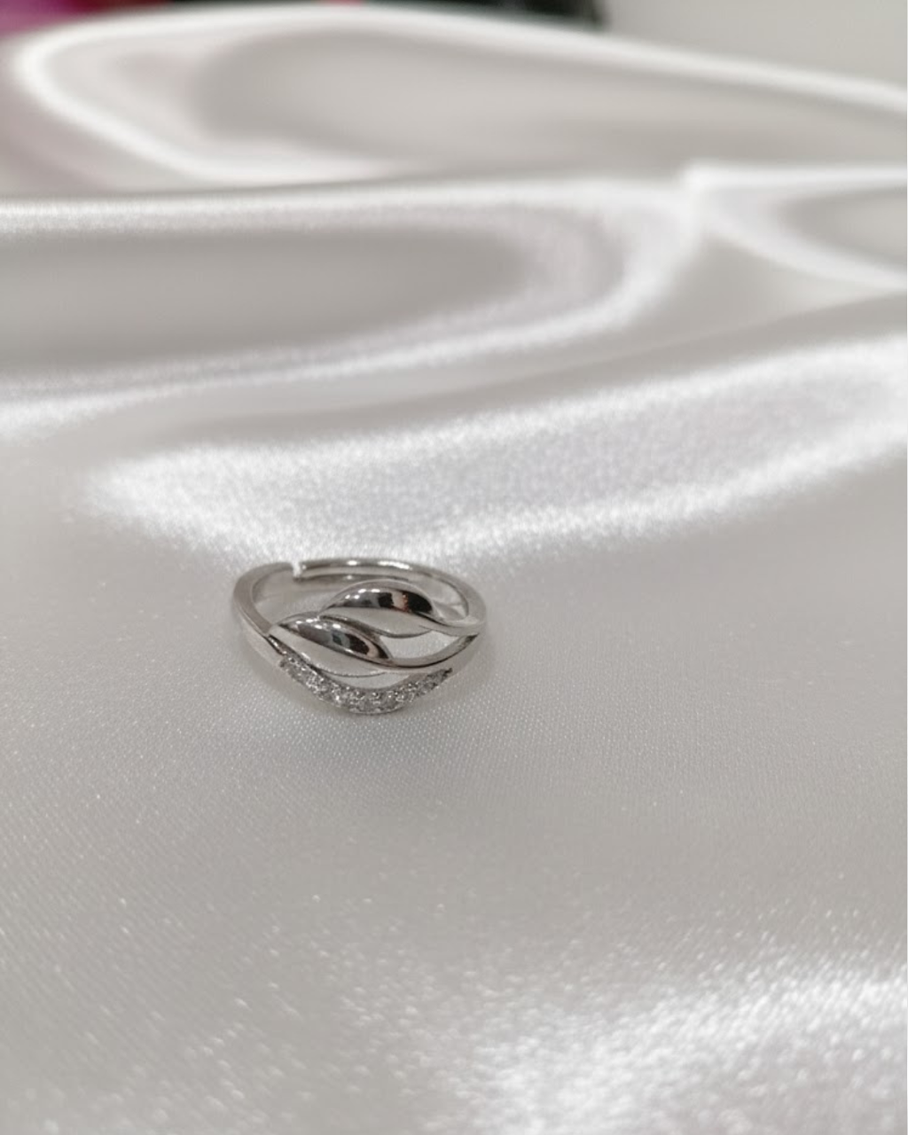 Sterling Silver Winding Wave Ring with American Diamonds