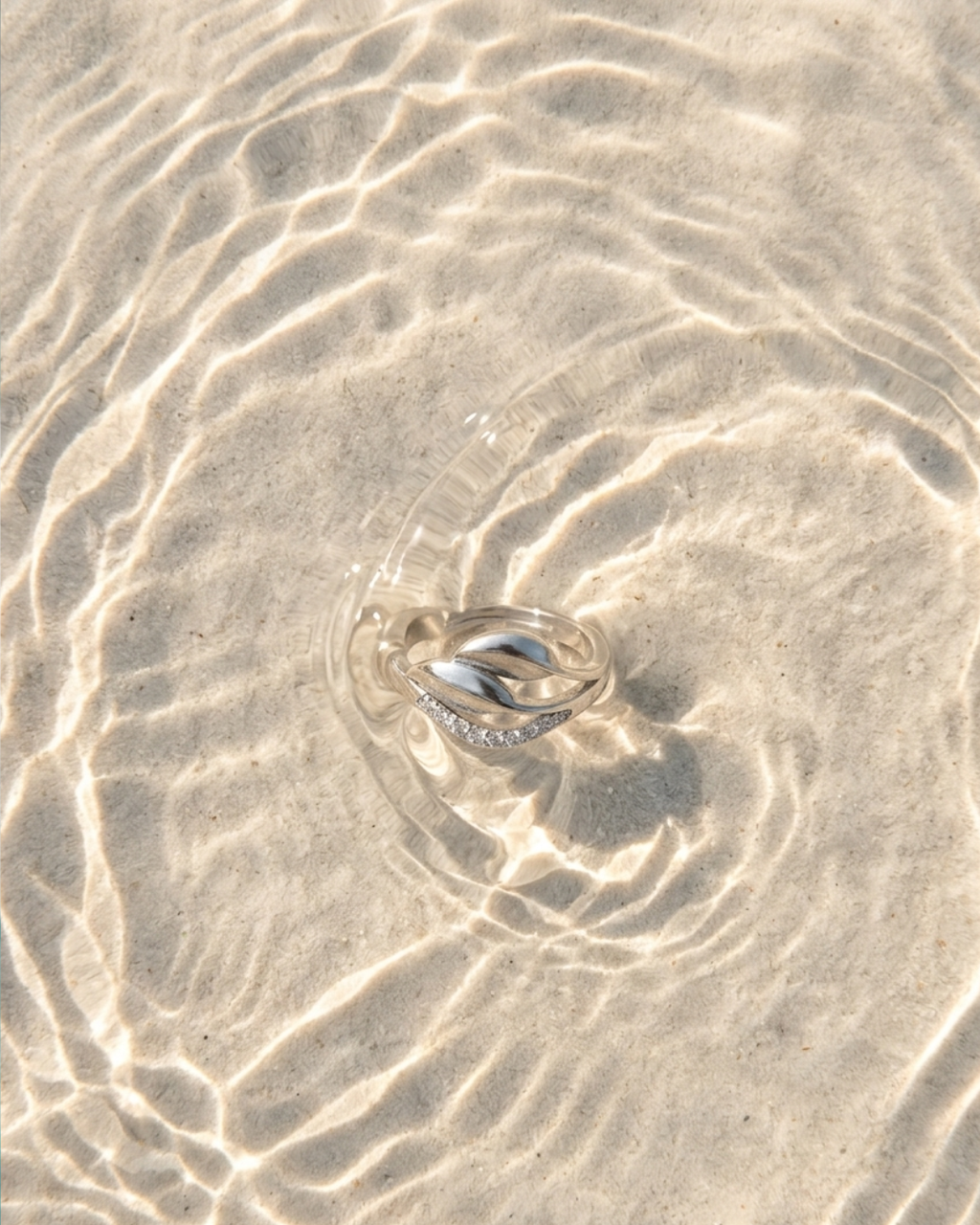Sterling Silver Winding Wave Ring with American Diamonds