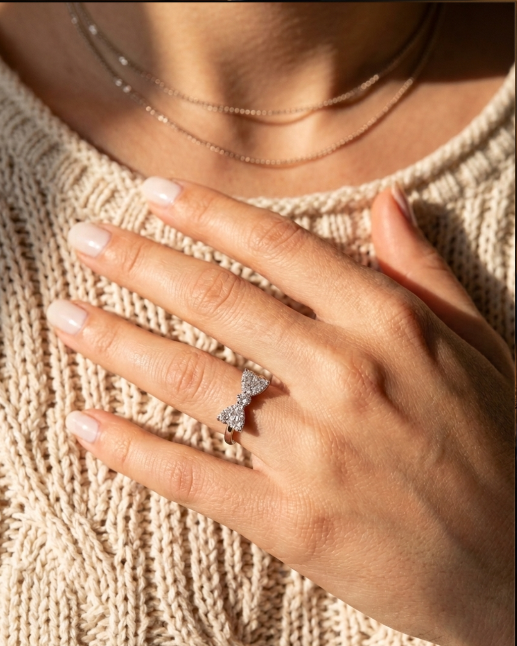 Sterling Silver Adjustable Bow Ring with Cubic Zirconia Stones