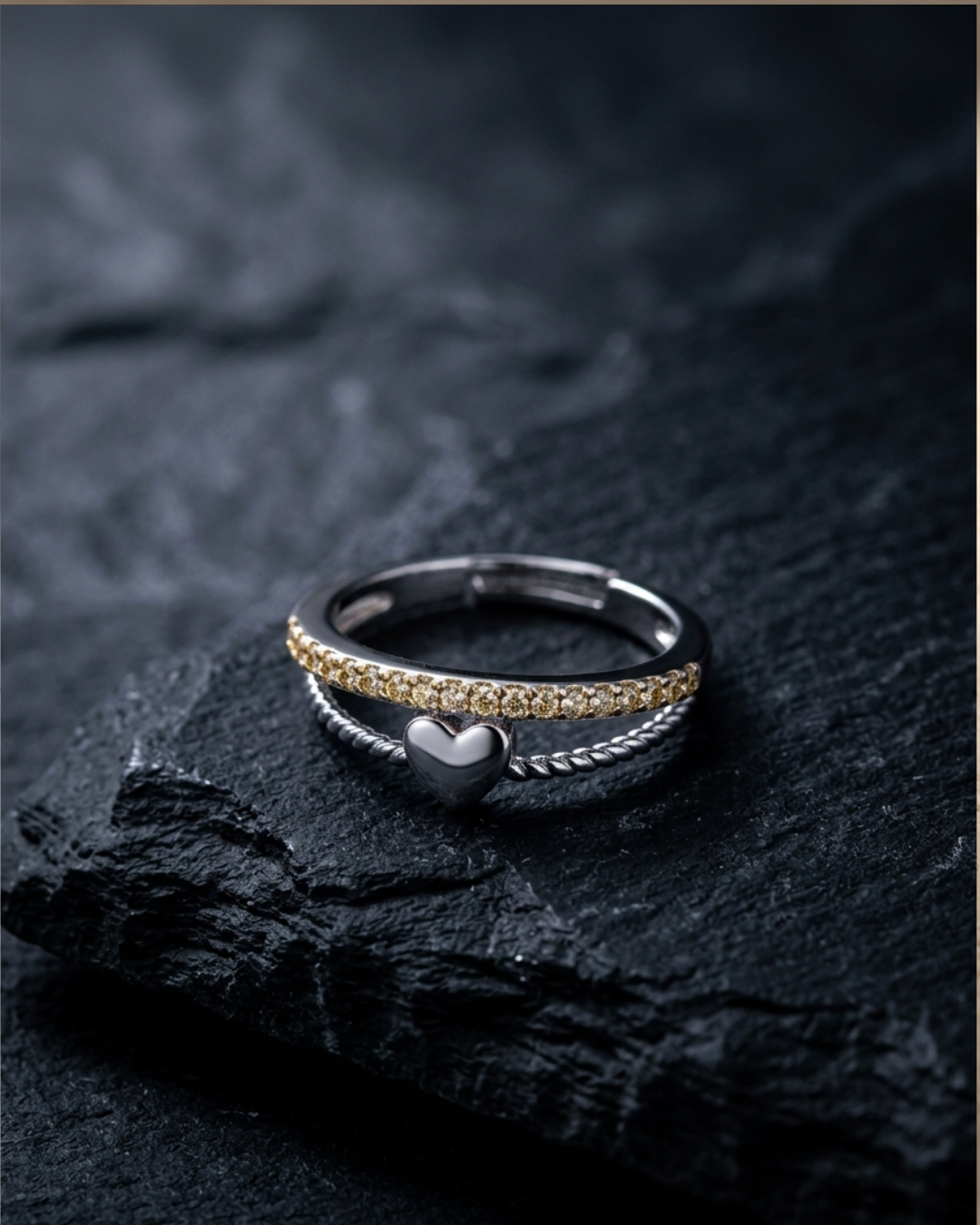 silver-plated adjustable ring with a heart charm and cubic zirconia stones