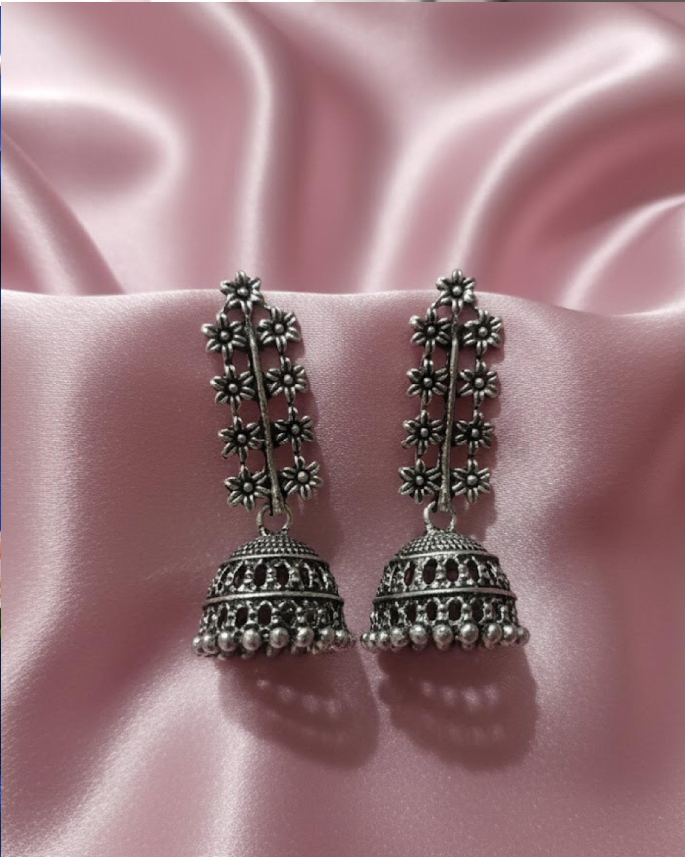 Oxidized Silver Jhumka Earrings With Floral Design