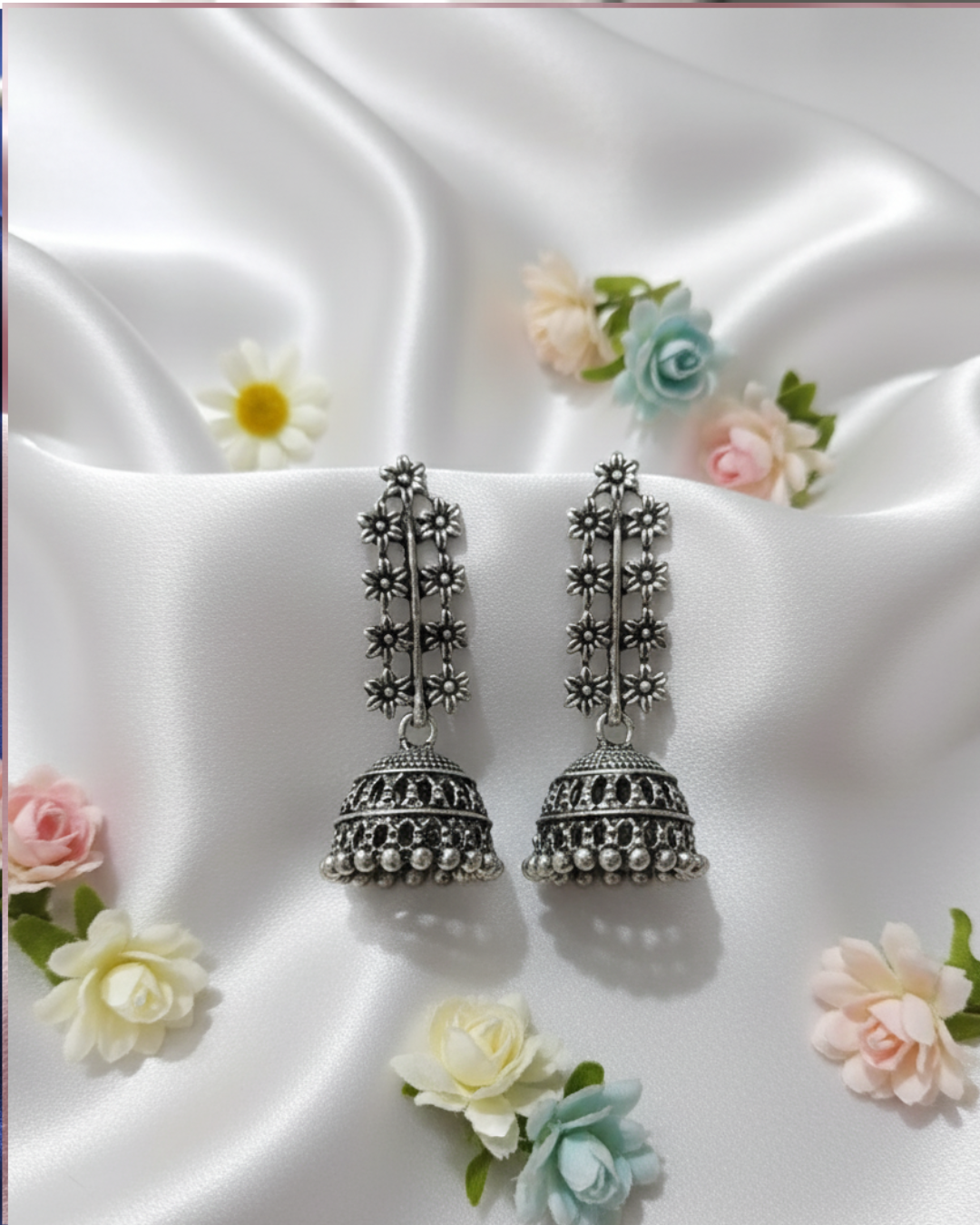 Oxidized Silver Jhumka Earrings With Floral Design